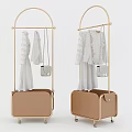 Gold Metal Clothes Rack with Brown Storage Compartment Hanging Clothes and Handbags on Wheels