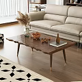 Beige Two Seater Sofa With Wooden Coffee Table And Decorative Items On Wooden Floor