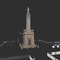 Park Landscape Featuring Monument With Statue Surrounded By Fence And Street Lamps