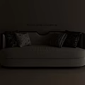 Stylish Beige Double Sofa With Black Frame And Black White Patterned Pillows