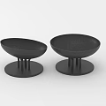 Two Black Ceramic Vessels With Modern Minimalist Design And Pedestal Base