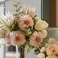 Glass Vase With Pink Dahlias White Flowers Pampas Grass On Wooden Table With Oranges Pear