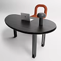 Modern Black Oval Desk With Laptop Table Lamp And Orange Chair
