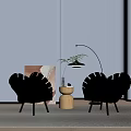 Brown and Silver Shell Shaped Chairs with Black Legs and Round Wooden Side Table