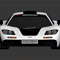 White Modern Sports Car Featuring Sleek Aerodynamic Design And Black Accents
