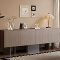 Modern Minimalist Entryway Cabinet and Sideboard with Decorative Vases Books Table Lamp and Wall Art