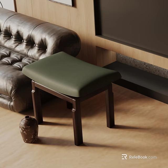 Green Padded Top Side Table With Dark Wooden Legs Beside Leather Sofa On Wooden Floor 3d model 