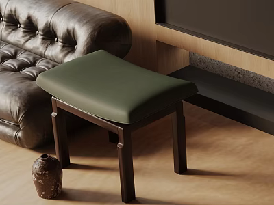 Green Padded Top Side Table With Dark Wooden Legs Beside Leather Sofa On Wooden Floor 3d model