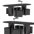 Black Oval Dining Table with Cube Structures Below and Transparent Vase with Green Plant 3d model