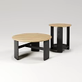 Two Modern Round Coffee Tables With Wooden Top And Dark Cross Legs Design