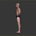 Muscular Shirtless Man Standing With Hands On Hips In Black Swim Trunks Against Gray Background