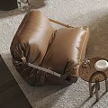 Brown Bean Bag Chair On Rug With Small Round Side Table And White Cup 3d model