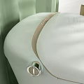 Modern White Toilet Design In Green Interior With Natural Light And Shadow