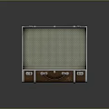 Vintage Leather Suitcase Open With Green Checkered Lining And Metal Fittings On Reflective Surface