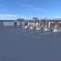 Modern Gas Station With Blue Roof Multiple Fuel Pumps Near Buildings In Desert Blue Sky