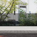 Modern Building Exterior Wall With Black Metal Grille Green Plants And Tree Surroundings