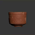 Red Carved Sculpture Bowl With Intricate Patterns On Dark Background