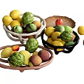 Fresh Lemons Avocados Peaches And Apples In White Black And Brown Fruit Bowls