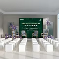 Elegant Floral Display Setup With Green Backdrop Purple Flowers And Chairs