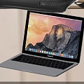 Sleek Open Laptop With Mountain Wallpaper Display And Modern Keyboard Design