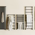 Modern Bathroom Towel Racks With White And Gray Towels On Wall