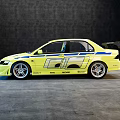 Yellow Sports Sedan With Body Decals Rear Spoiler And Sporty Exterior Design