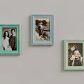Light Green And Light Blue Photo Frames With Photos Hanging On Wall