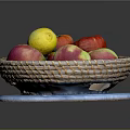 Fresh Assorted Fruits in Woven Basket with Colorful Apples and Lemon on Blue Cloth