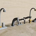 Various Faucet Designs Displayed on Countertop with Light Colored Wall