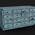 Vintage Blue Decorative Cabinet With Multiple Drawers And Worn Appearance