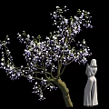 Blooming Tree With Purple White Flowers And Standing White Statue Figure