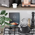 Stylish Kitchen Utensils Collection Featuring Orange Mixer Knife Block Coffee Maker Cookbook And Green Plant