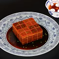Traditional Chinese Cuisine Display with Roast Suckling Pig and Assorted Pastries with Sauce Dishes