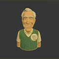 Smiling Man in Green Argyle Vest with Chipper Chief Badge Cartoon Figurine