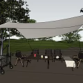 Garden Landscape With Outdoor Canopy Tables Chairs Trees And Green Grass