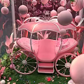 Decorative Pink Carriage In Glass Greenhouse With Balloons And Green Plants