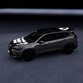Sleek Silver SUV With Black Roof And Red Accent Wheels On Gray Floor