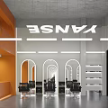 Modern Hair Salon Interior With Orange Walls Arched Mirrors Black Chairs And White Lighting