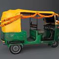 Colorful Auto Rickshaw With Yellow Roof Green Body And Orange Garland Decorations