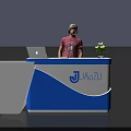 Exhibition Reception Desk With Blue And White Design Laptop And Small Plant
