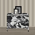 Modern Nightstand With Black And White Marble Top Two Photo Frames White Cup And Magazine