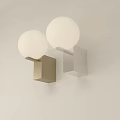 Modern Gold And White Wall Lamps With Round Globe Shades On White Wall
