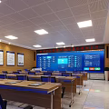 Administrative Service Hall Interior With Blue Walls Desks Chairs File Cabinets And Computers