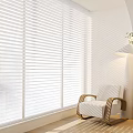 White Venetian Blinds on Window in Modern Interior with Rocking Chair and Light Patterns