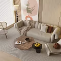 Beige Curved Sofa And Round Wooden Coffee Table Set With Pillows Throw Blanket Decorative Art