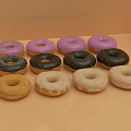 Assorted Donuts With Purple Black Glazes And Plain Varieties On 3d model
