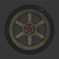 Stylish Tire with Golden Five Spoke Rim Red Center and Tread Pattern on Dark Background
