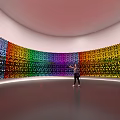 Colorful Rainbow Art Installation With Curved Interactive Wall In Gallery Space