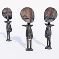 Three Abstract Wooden Sculptures With Elongated Necks And Distinct Facial Features
