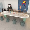Kids White Table Green Chair Set With Building Blocks And Teddy Bear Decor